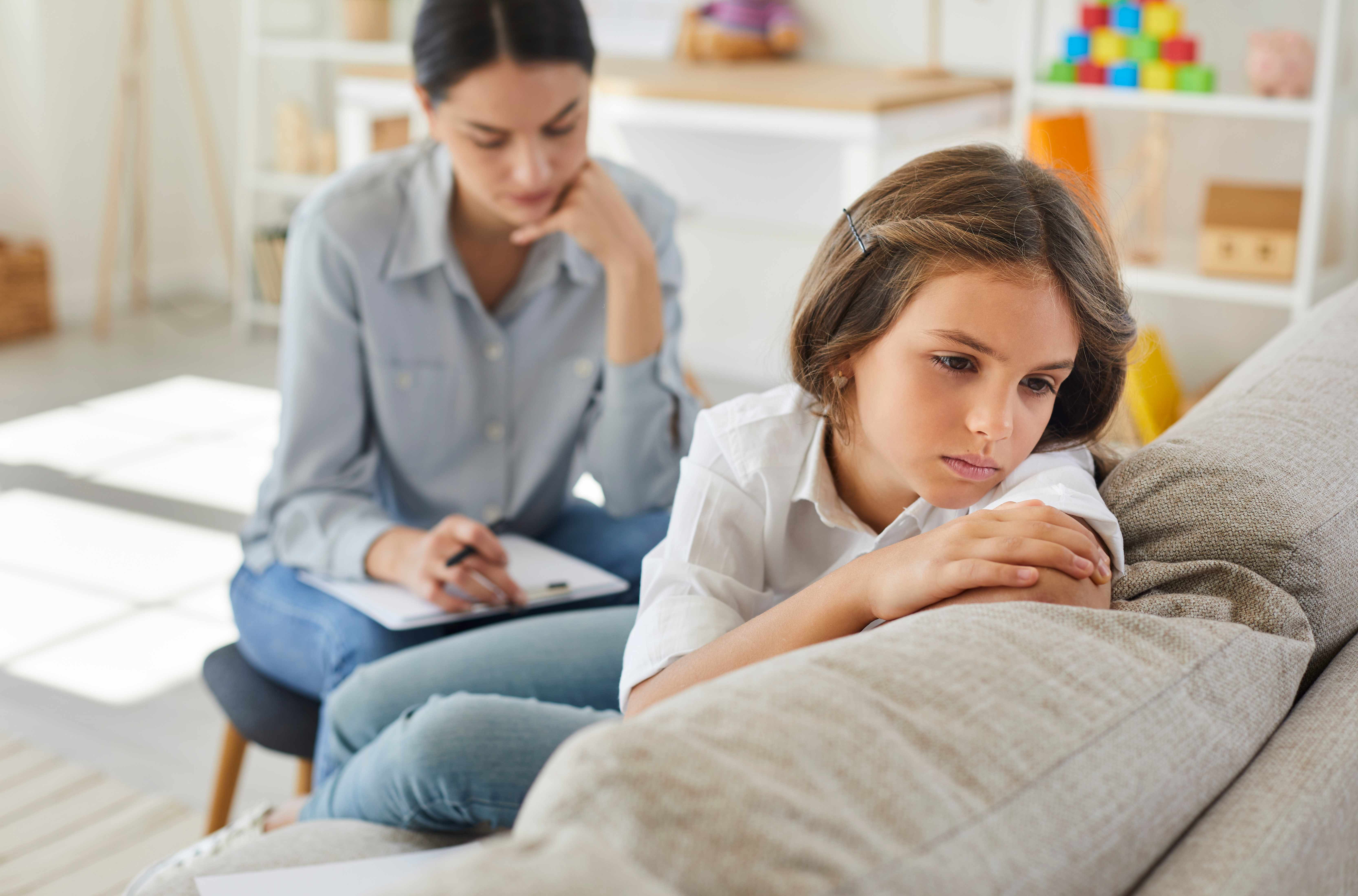 Psychologist working with a child client